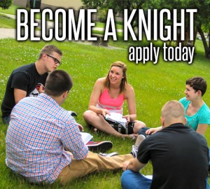 Five people sit in a circle on a grassy lawn, engaged in conversation and holding papers. "BECOME A KNIGHT apply today" is written in bold letters at the top of the image.
