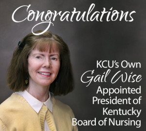 A woman with shoulder-length hair smiles at the camera. The text reads: "KCU's Own Gail Wise Appointed President of Kansas City University.