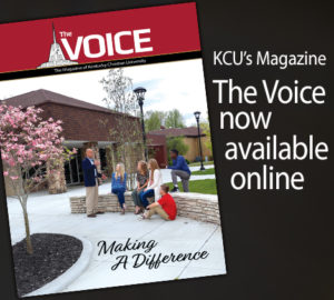 Cover of KCU's Magazine, "The Voice," features a group of people sitting outdoors in a courtyard. The text reads, "The Voice now available online.